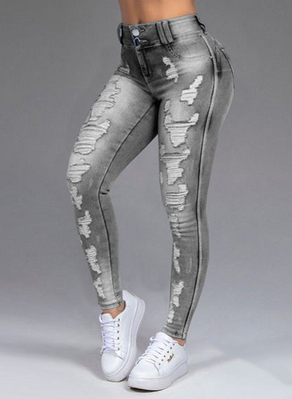 Ladies Jeans Ripped Holes Show