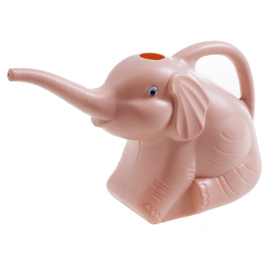 Baby elephant watering flowers